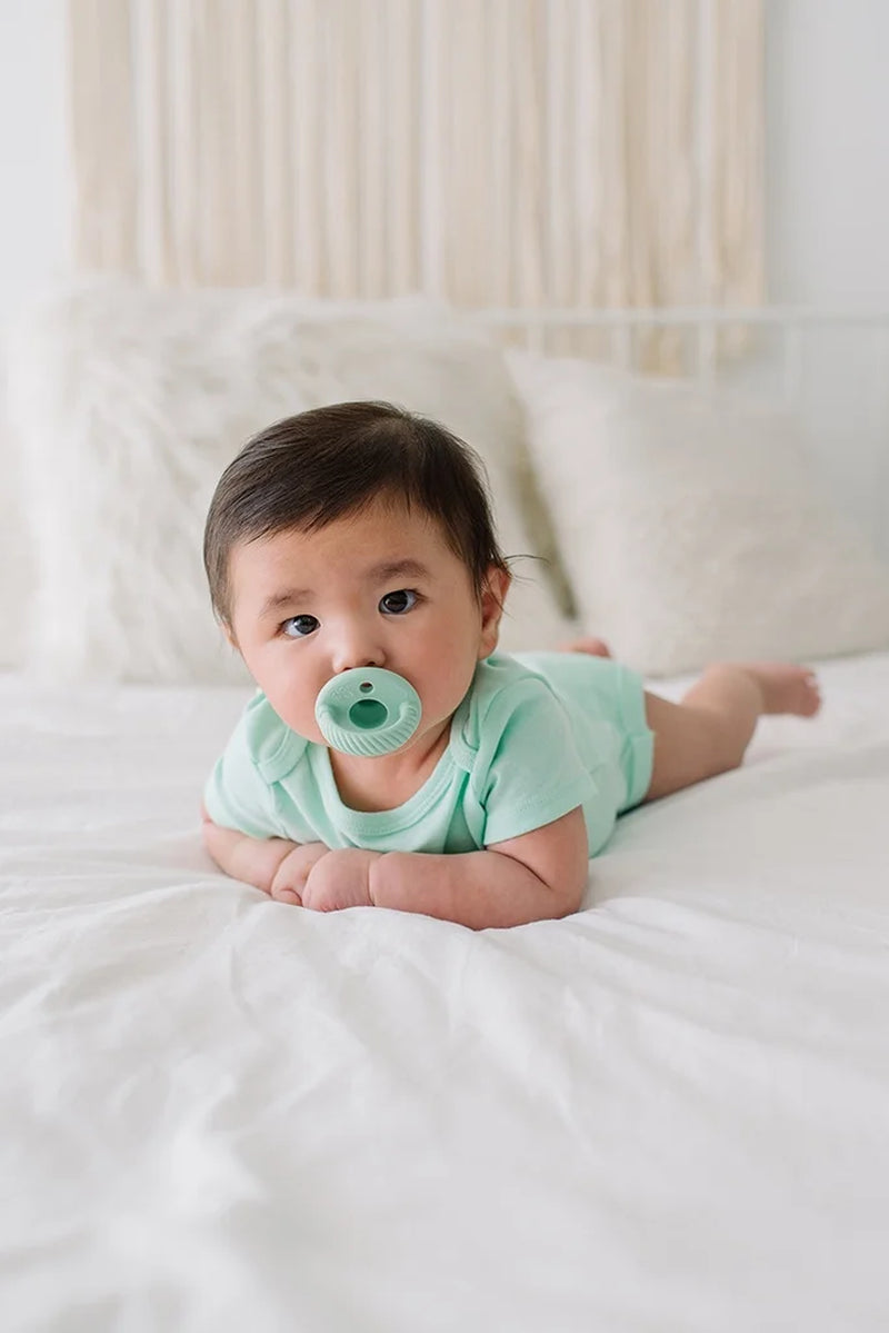 Sweetie Soother Pacifier Set of 2- Silicone Newborn Pacifiers with Collapsible Handle & Two Air Holes for Added Safety; Set of 2 in Green and White, Ages Newborn & Up